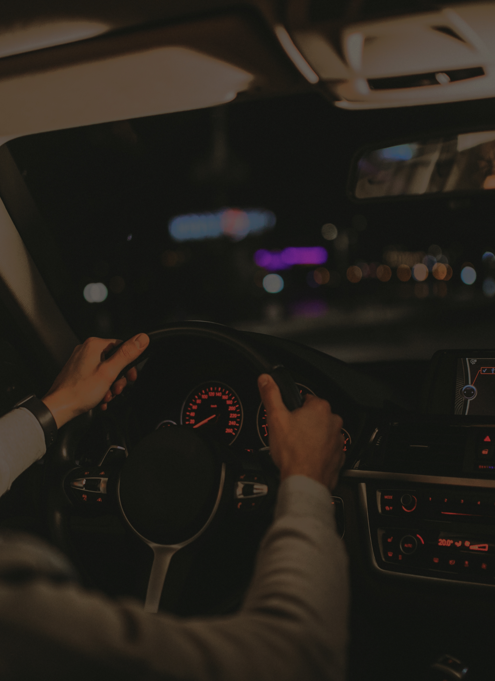 young-man-driving-his-car-at-night-time (1) young-man-driving-his-car-at-night-time (1)